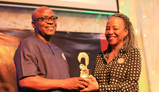 Waziri Adio, the Executive Secretary of the Nigeria Extractive Industries Transparency Initiative (NEITI) receiving the Anti-Corruption Defender Award from Ayo Obe, lawyer and human rights activist during the 13th Wole Soyinka Award for Investigative Reporting at NECA House, Alausa in Lagos.