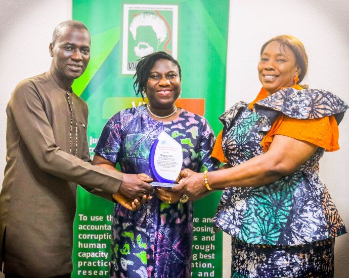 From left to right: Motunrayo Alaka, Executive Director/CEO, Wole Soyinka Centre for Investigative Journalism in the middle being presented with Distinguished media gender equity advocate' Award by Lekan Otufodunrin, Director of Media Career Development Network (left) and a member of the MCDN Board of Trustees, Cookey Ugomma (right)