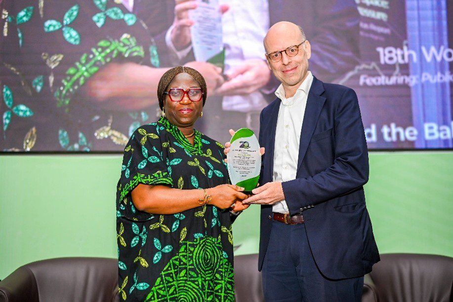 Picture1 Motunrayo Alaka, Executive Director/CEO, WSCIJ presenting an award of honour to Michel Deelen, Outgoing Consul General of the Netherlands in Lagos